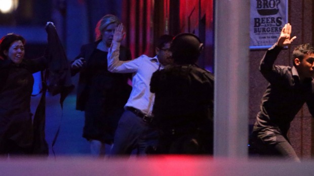 Hostages flee after police raided the Lindt cafe