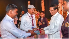 “පොළොන්නරුව” පර්යේෂණාත්මක ශාස්ත්‍රීය සංග්‍රහය ජනපති අතින් පොළොන්නරුව පාසල් සිසුන්ට සහ ජනතාවට